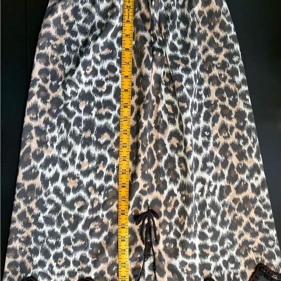 VINTAGE ARISTOCRAFT LEOPARD PRINT SLIP WITH BLACK TRIM SIDE SLITS SIZE MEDIUM - Picture 9 of 13